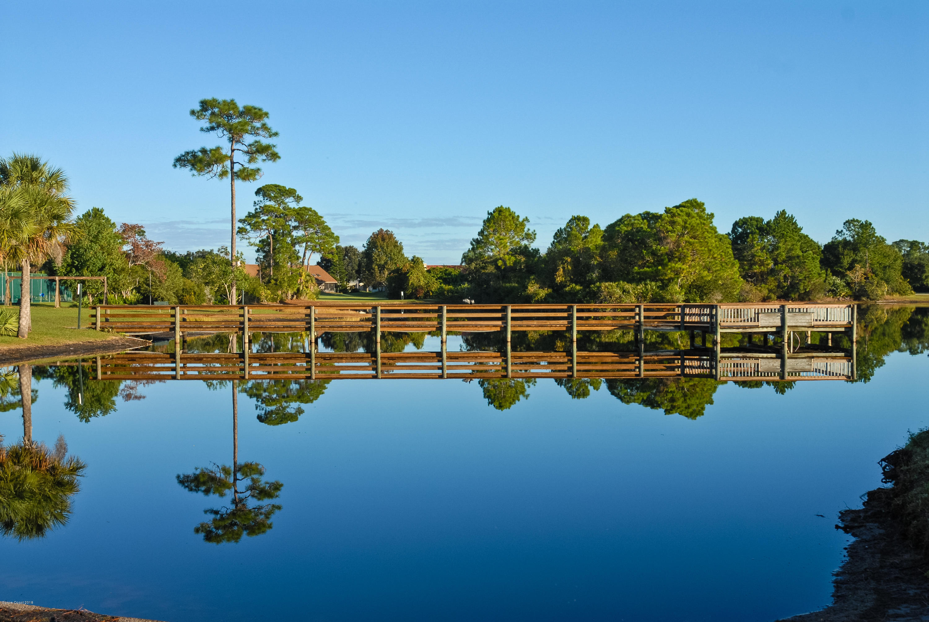 3535 Shady Run Road Melbourne, FL 32934 - Photo 28 of 30 a view of a lake with a water fall