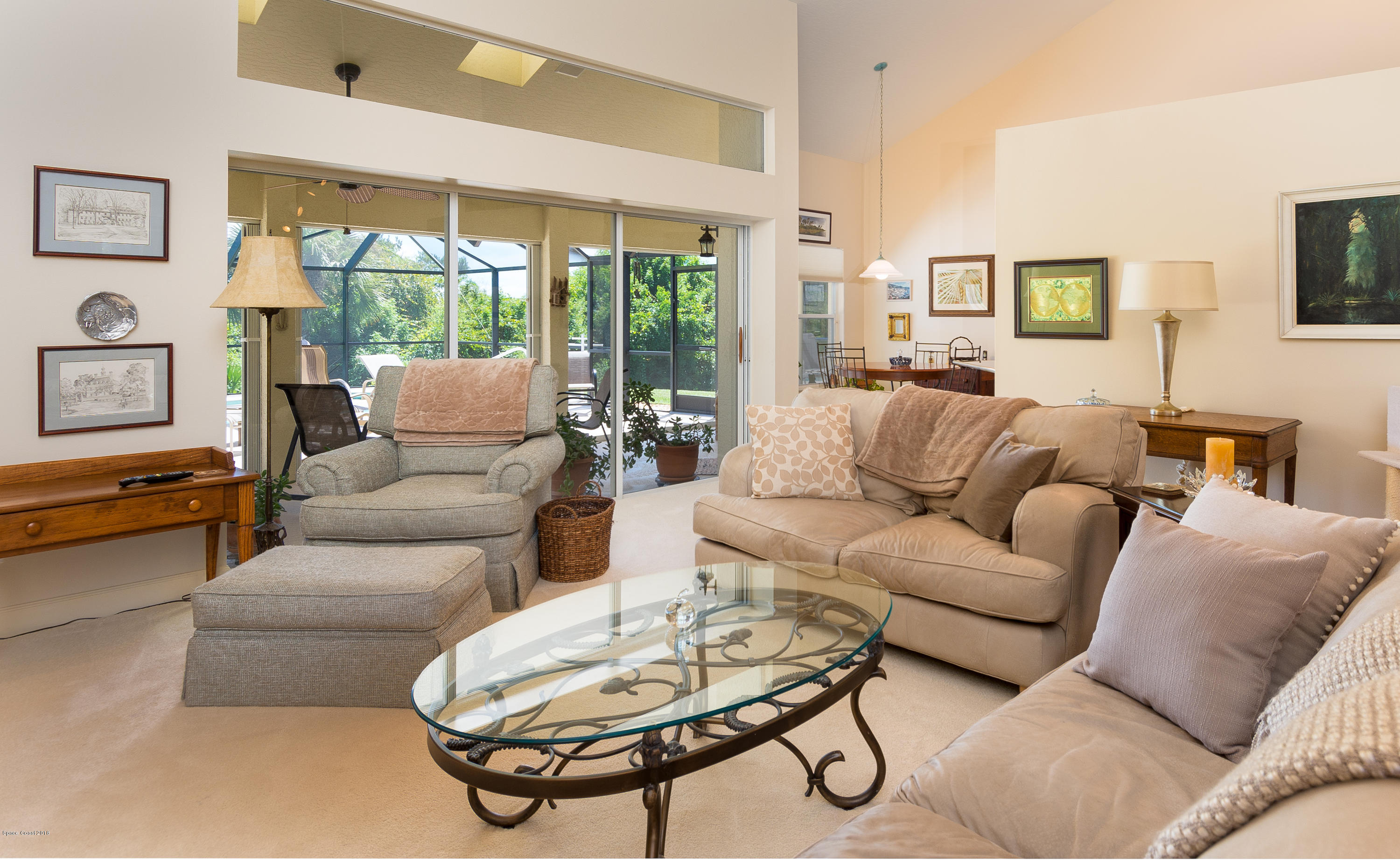 3535 Shady Run Road Melbourne, FL 32934 - Photo 5 of 30 a living room with furniture and a large window