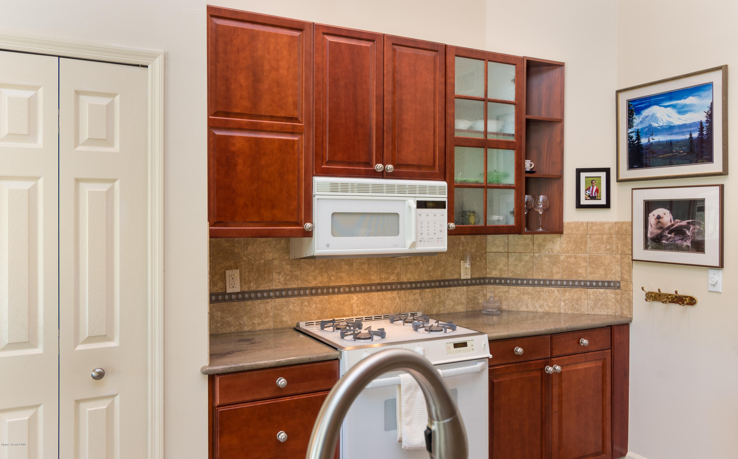 3535 Shady Run Road Melbourne, FL 32934 - Photo 8 of 30 a utility room with dryer and washer