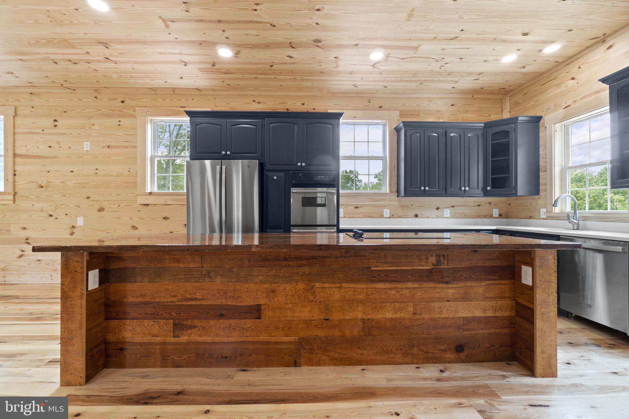 13316 Compton Road Clifton, VA 20124 - Photo 11 of 39 a view of kitchen with granite countertop cabinets and window