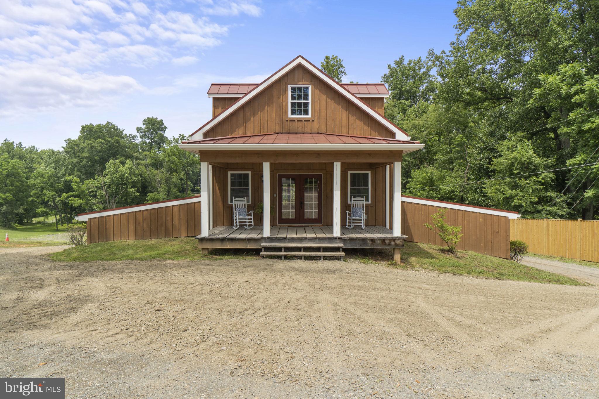 13316 Compton Road Clifton, VA 20124 - Photo 2 of 39 a view of a house with roof deck