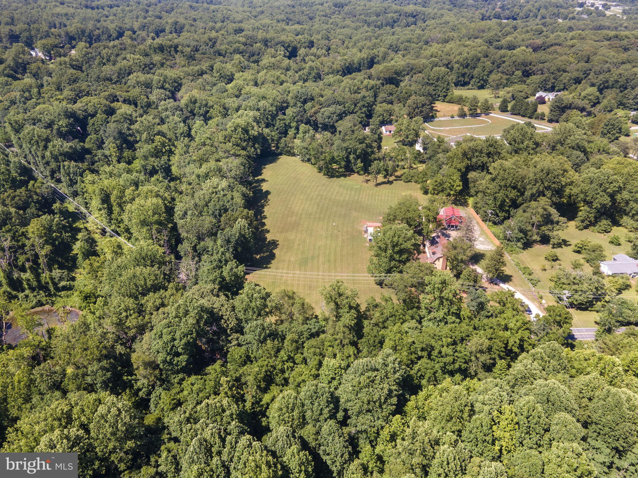13316 Compton Road Clifton, VA 20124 - Photo 27 of 39 a view of a lake with a house