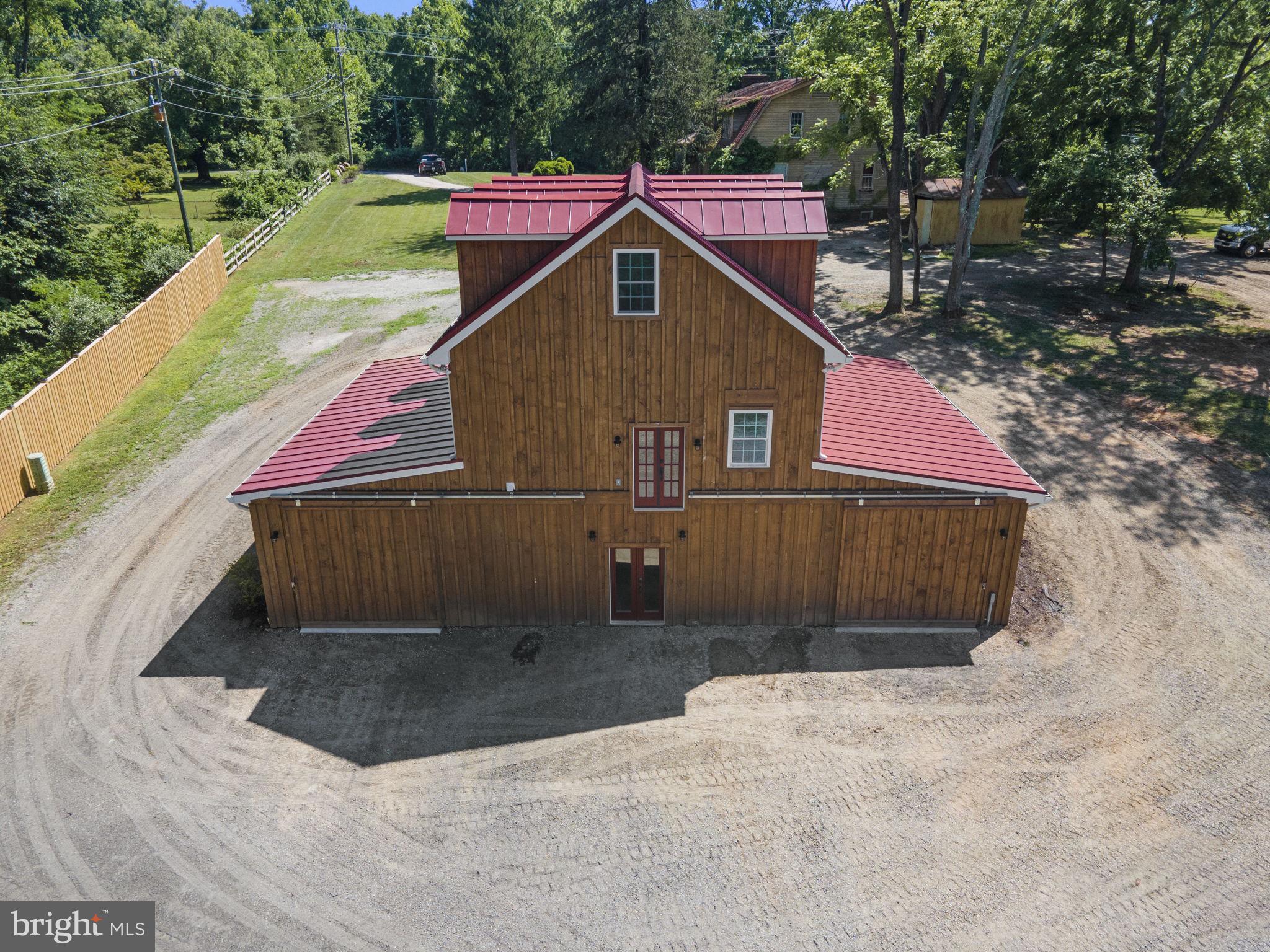 13316 Compton Road Clifton, VA 20124 - Photo 35 of 39 a view of a wooden house with a yard