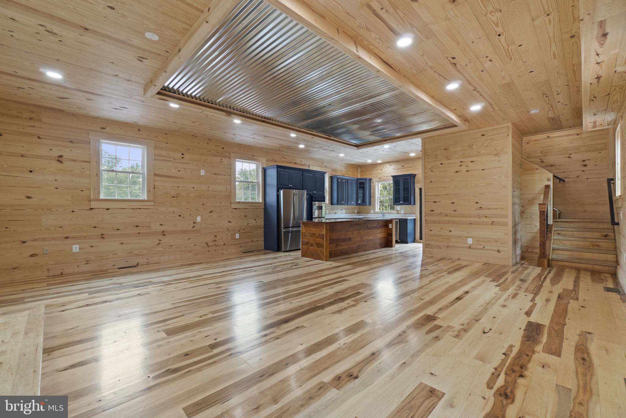 13316 Compton Road Clifton, VA 20124 - Photo 5 of 39 a view of empty room with wooden floor
