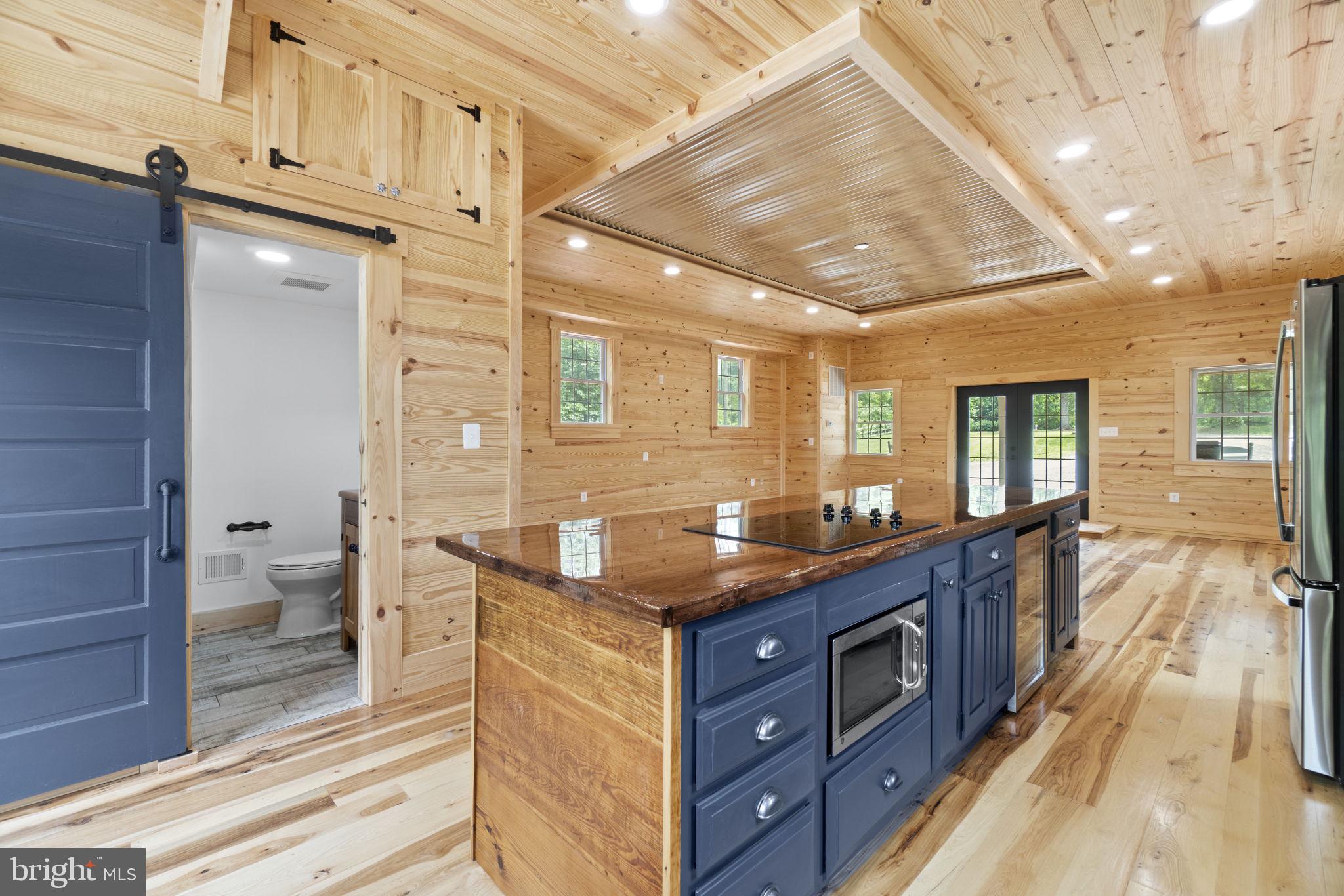 13316 Compton Road Clifton, VA 20124 - Photo 10 of 39 a spacious bathroom with a granite countertop sink a toilet and a shower