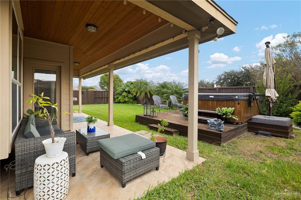 3901 Santa Veronica Street Mission, TX 78572 - Photo 16 of 22 a view of a patio with couches chairs and a table and chairs