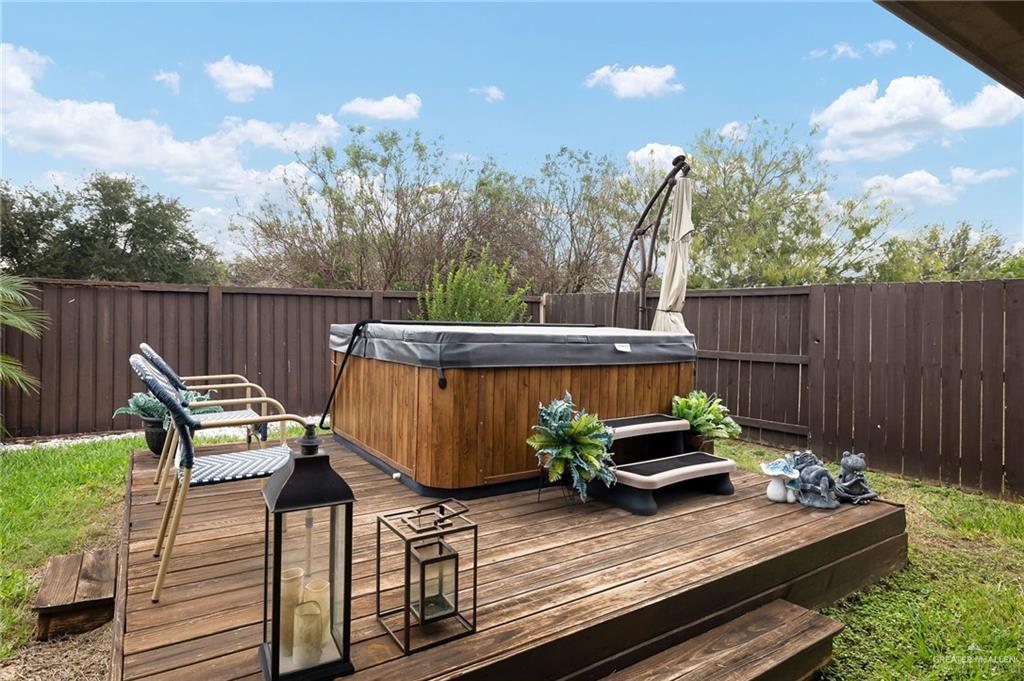 3901 Santa Veronica Street Mission, TX 78572 - Photo 18 of 22 a view of a wooden deck with furniture