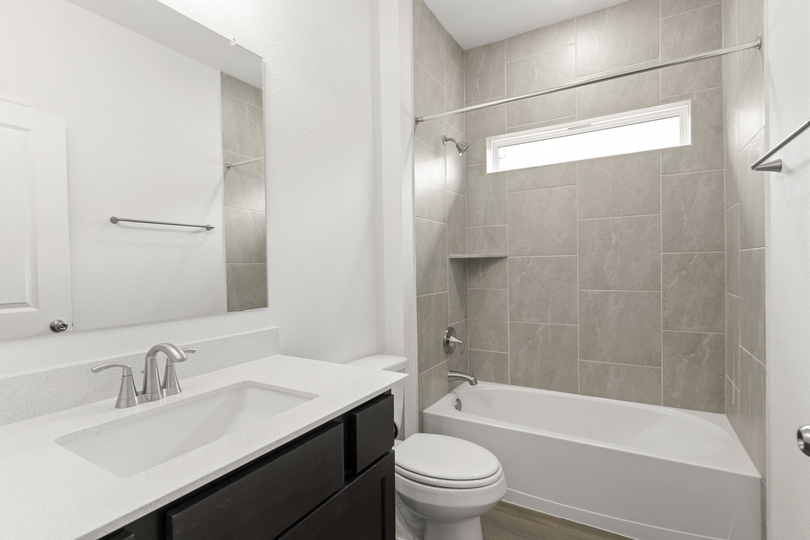 3725 Pin Oak Hills Seguin, TX 78155 - Photo 15 of 21 Full bath with bathing tub / shower combination, vanity, and dark wood-style floors