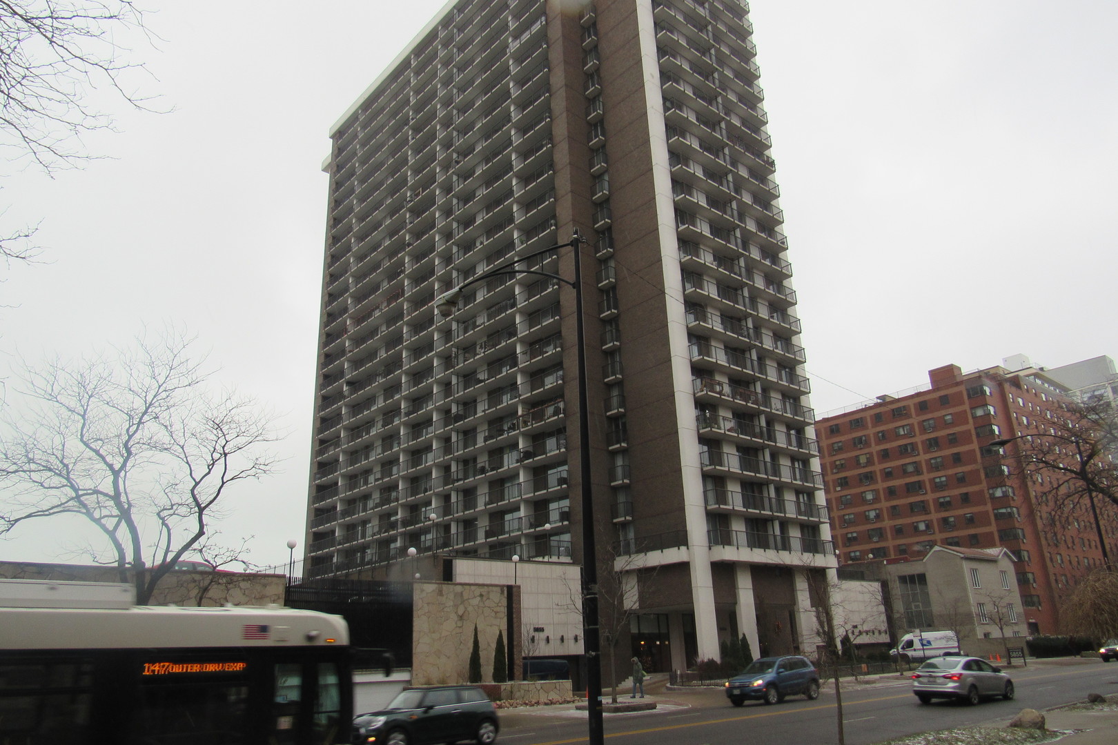 5855 North Sheridan Road, Unit 14CE Chicago, IL 60660 - Photo 2 of 14 front view of a building with a street