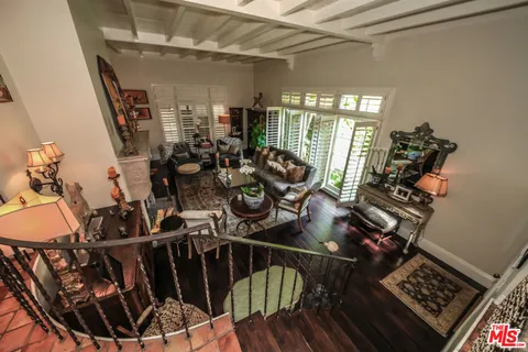 a view of a chairs and table in a room
