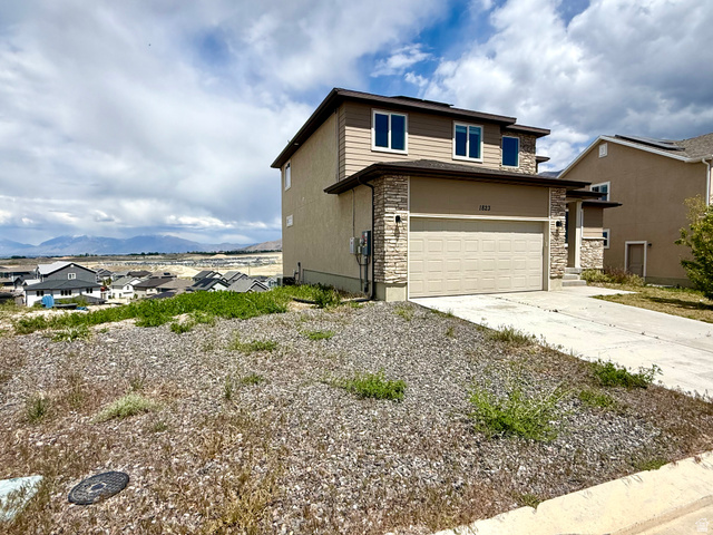1823 South Longview Road Santaquin, UT 84655 - Photo 2 of 69 Two-story residence featuring a two-car garage and stone veneer accents
