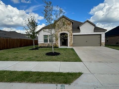 1109 Colonial Bluff Lane Princeton, TX 75407 - Photo 1 of 1 a front view of a house with garage