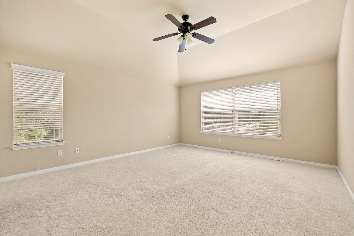 676 Rusk Road Round Rock, TX 78665 - Photo 17 of 35 Upstairs spacious primary suite