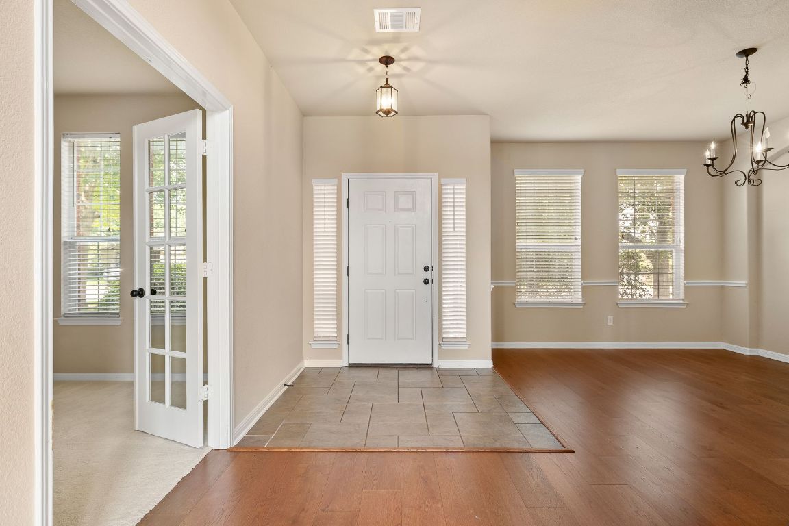 676 Rusk Road Round Rock, TX 78665 - Photo 5 of 35 Step inside to the foyer, study and formal dining room