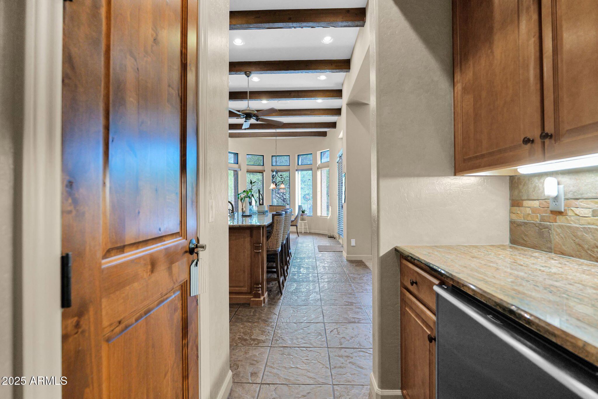 4207 North Arboles Circle Mesa, AZ 85207 - Photo 15 of 71 a view of a kitchen from the hallway