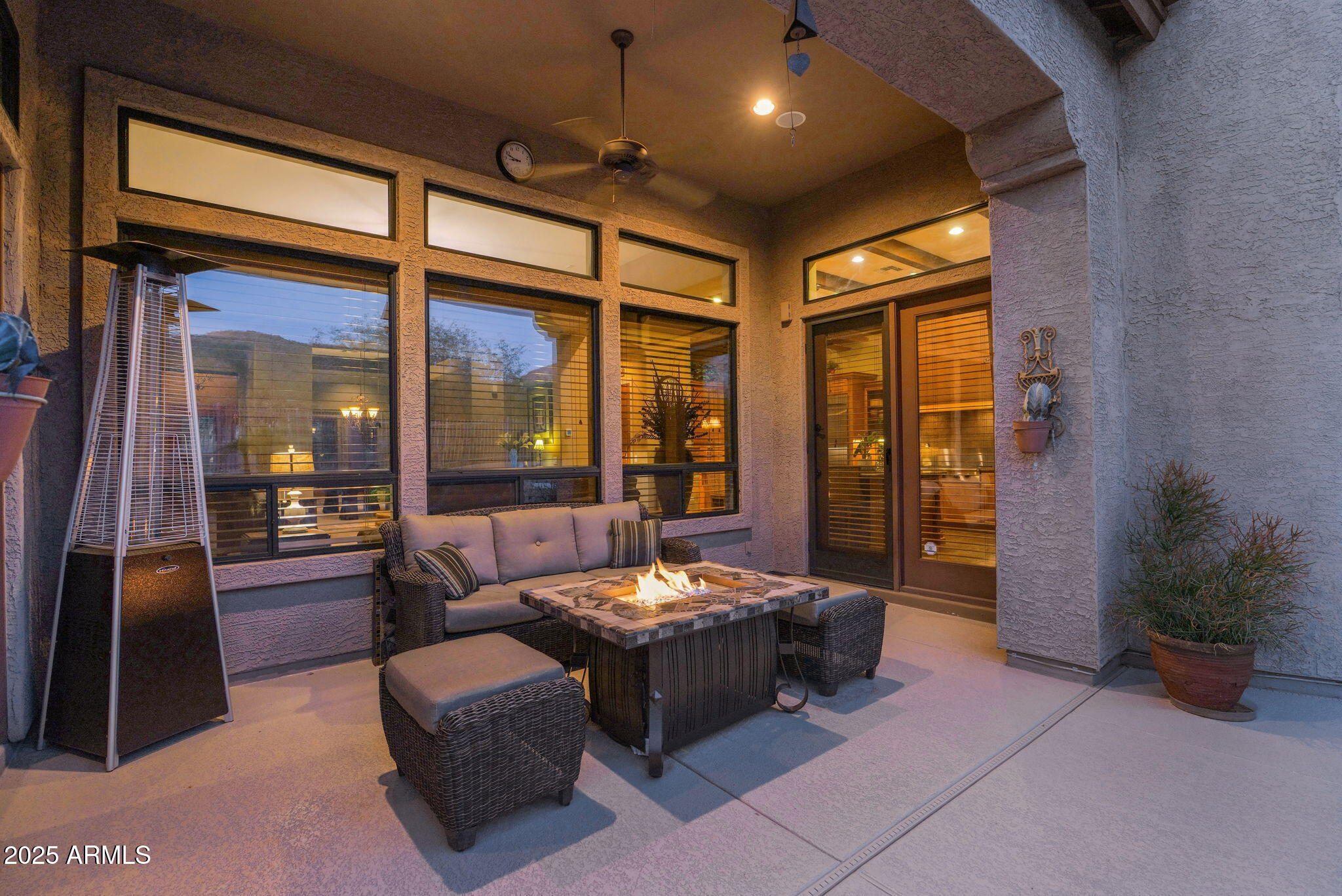 4207 North Arboles Circle Mesa, AZ 85207 - Photo 24 of 71 a living room with furniture and a large window