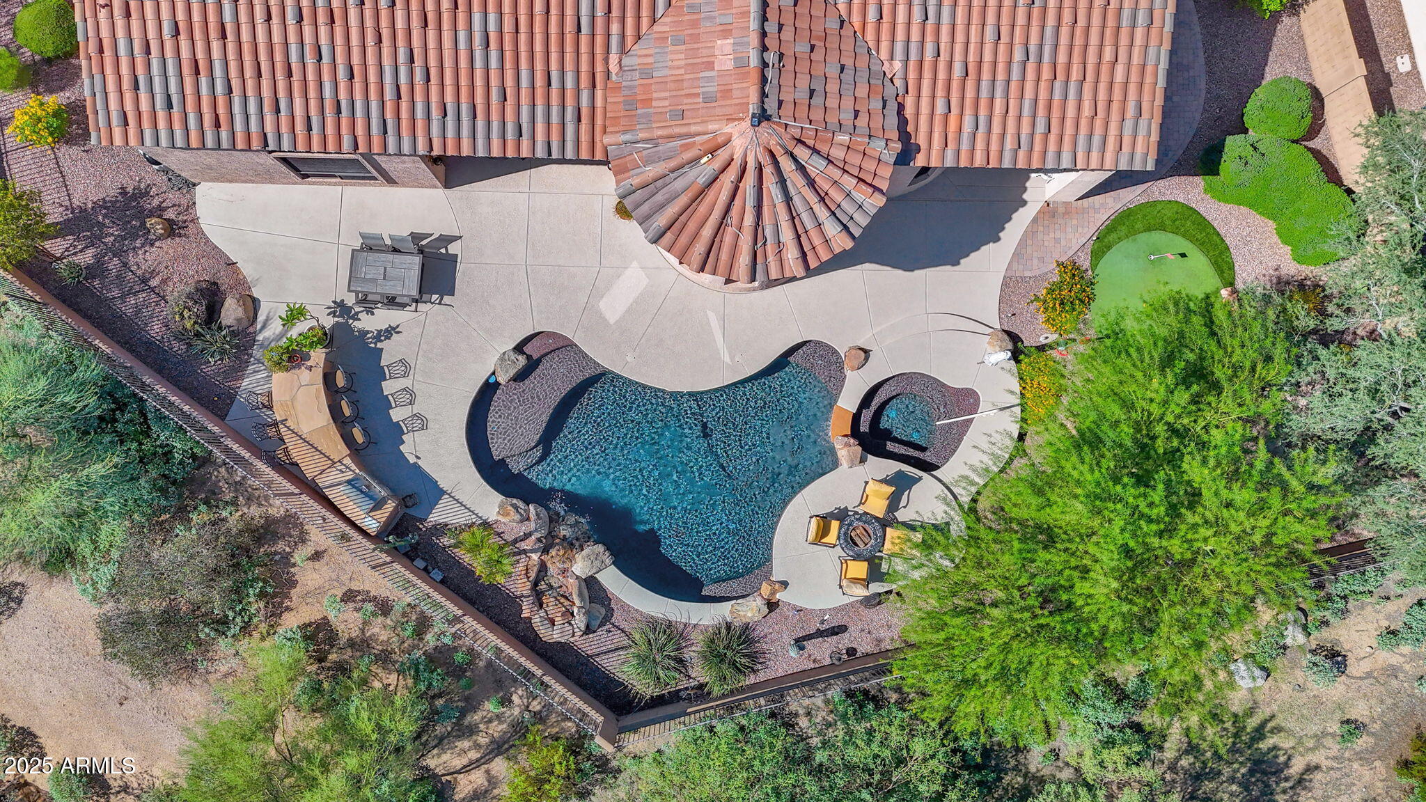4207 North Arboles Circle Mesa, AZ 85207 - Photo 49 of 71 an aerial view of a backyard with garden