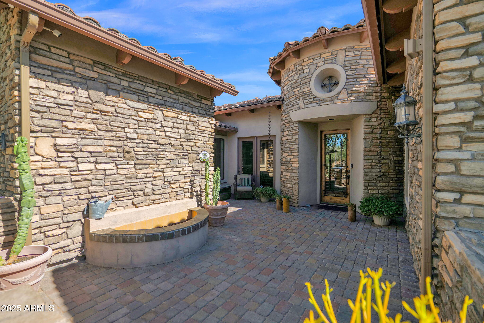 4207 North Arboles Circle Mesa, AZ 85207 - Photo 5 of 71 a view of an entryway with outdoor space