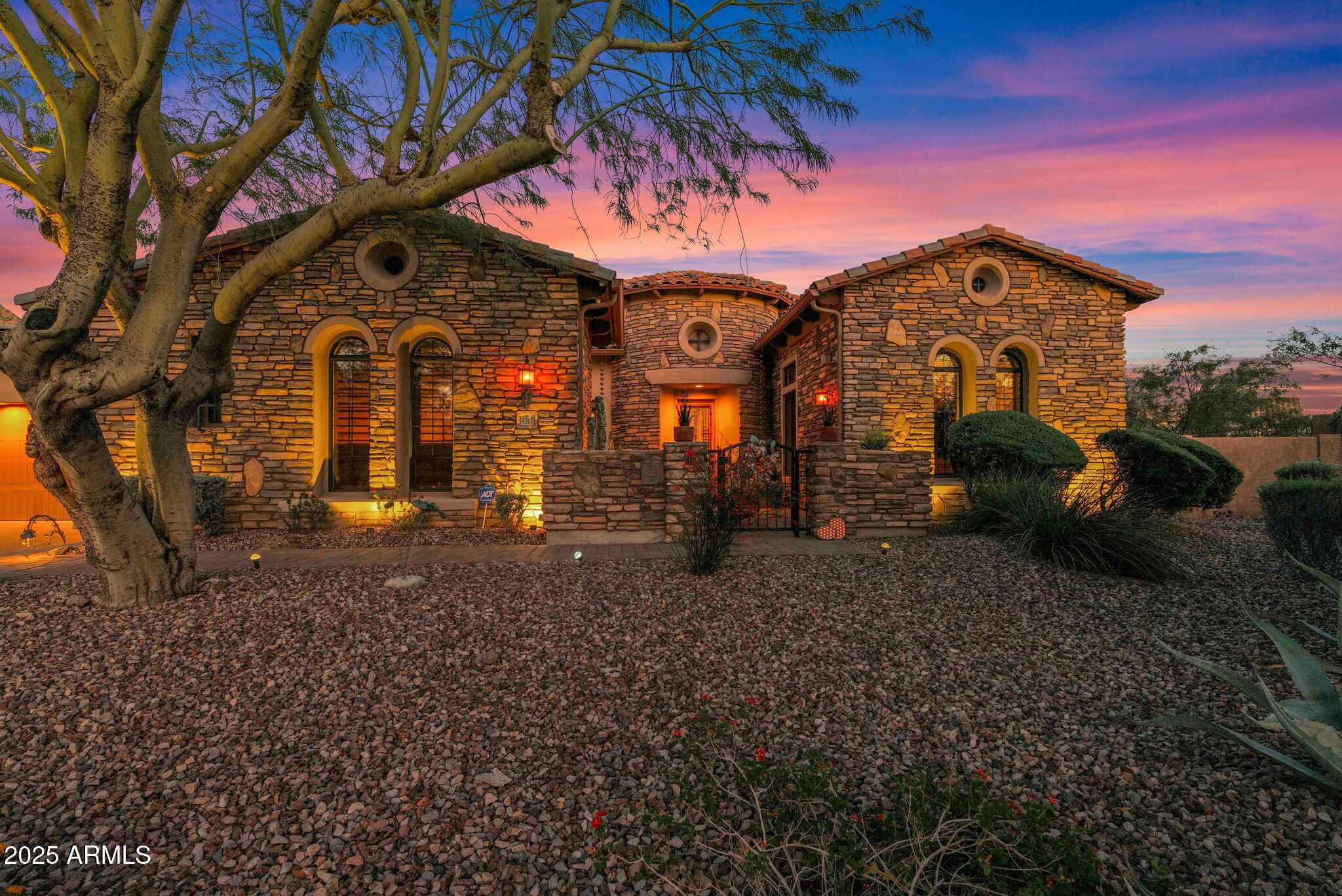 4207 North Arboles Circle Mesa, AZ 85207 - Photo 70 of 71 a front view of a house with a yard