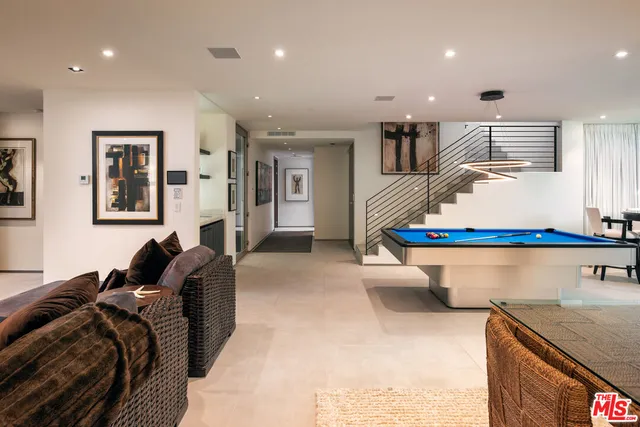 a living room with furniture and a couch