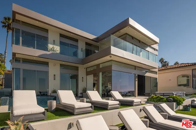a lobby with furniture and rug