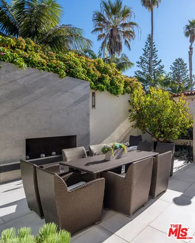 a view of swimming pool with outdoor seating