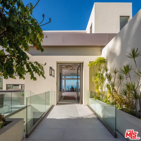 a view of a two door with an outdoor space