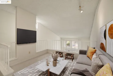 a kitchen with stainless steel appliances granite countertop a sink stove and microwave