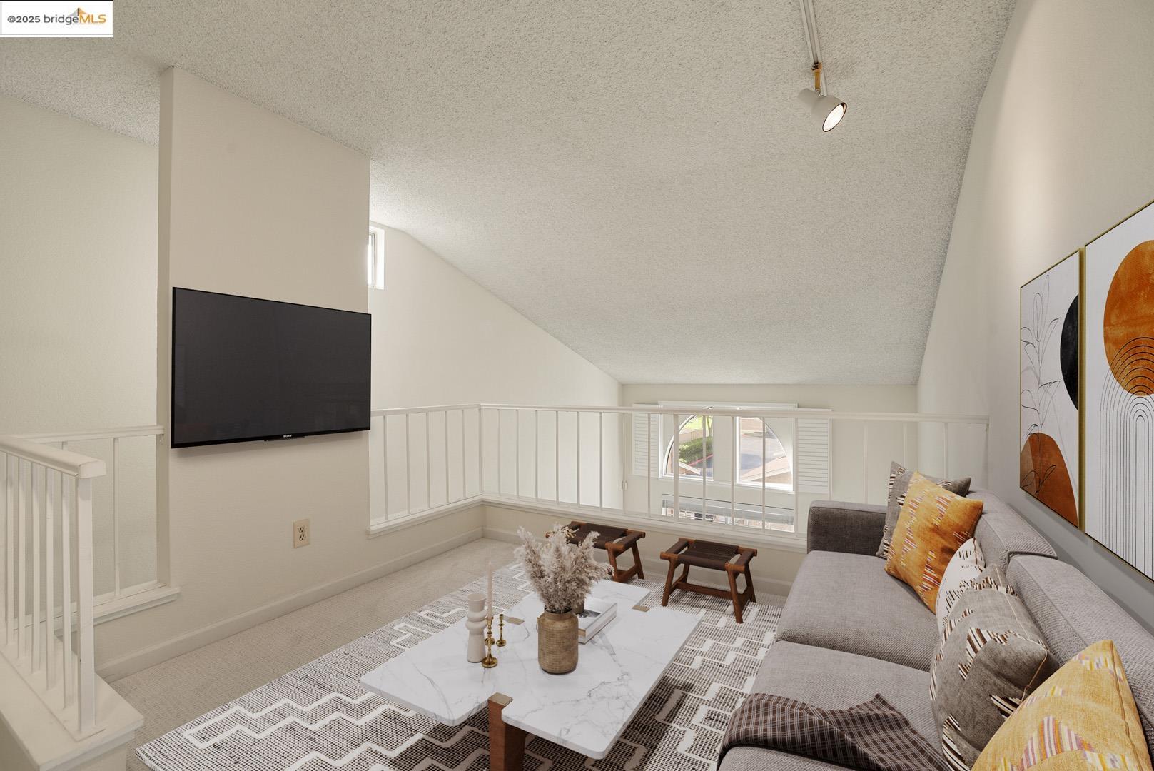 44 Glenwood Hercules, CA 94547 - Photo 12 of 35 a living room with furniture and a flat screen tv