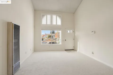 an entryway of a house with a window