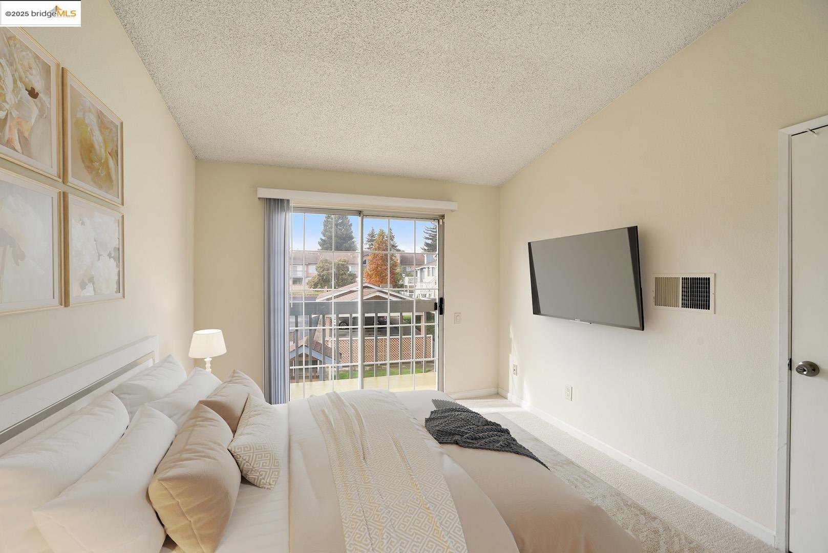 44 Glenwood Hercules, CA 94547 - Photo 17 of 35 a bedroom with a bed and a window