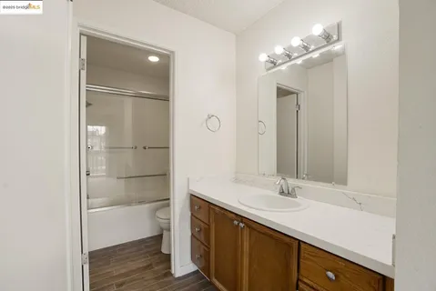 a bathroom with a toilet and a sink