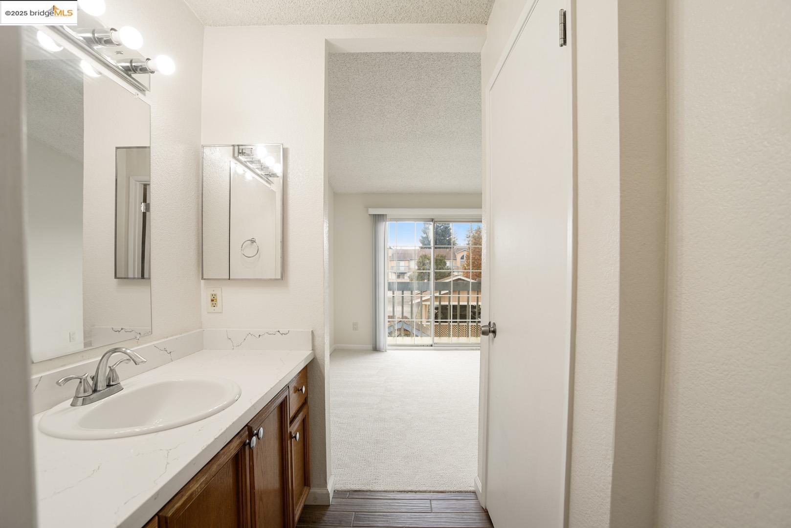44 Glenwood Hercules, CA 94547 - Photo 26 of 35 a bathroom with a sink and a mirror