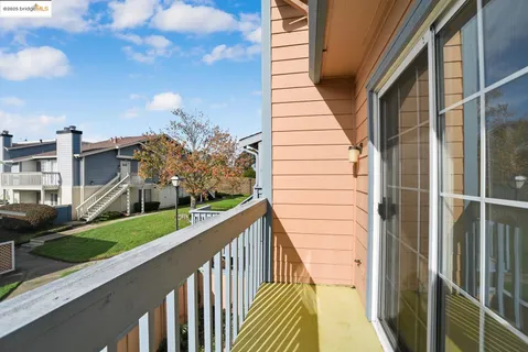 a view of a balcony with lake view