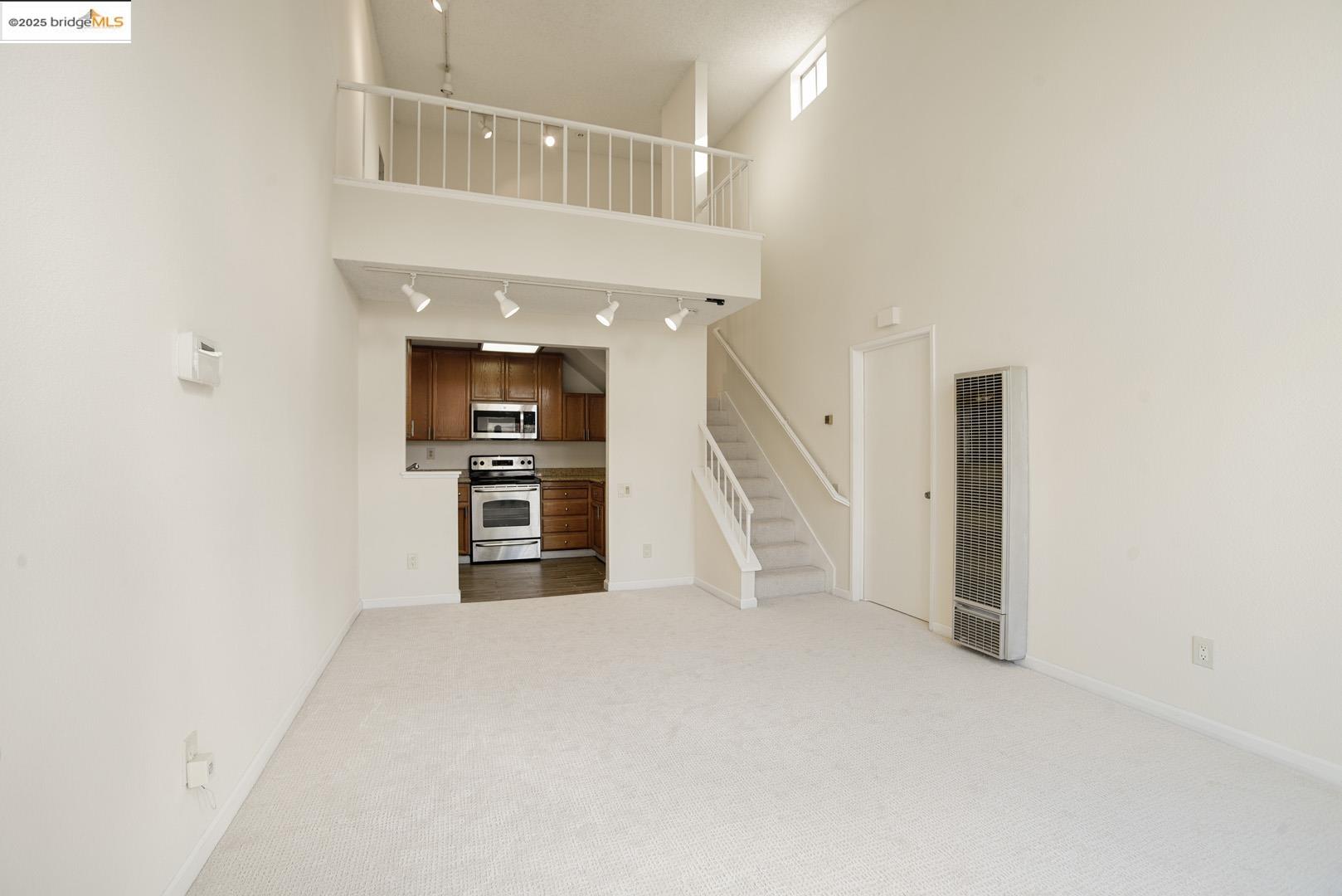 44 Glenwood Hercules, CA 94547 - Photo 4 of 35 a view of a hallway with an empty room