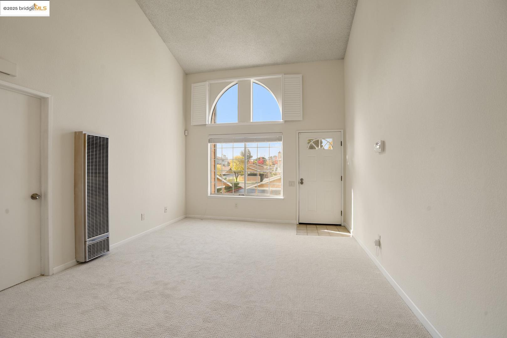 44 Glenwood Hercules, CA 94547 - Photo 5 of 35 an empty room with windows and closet