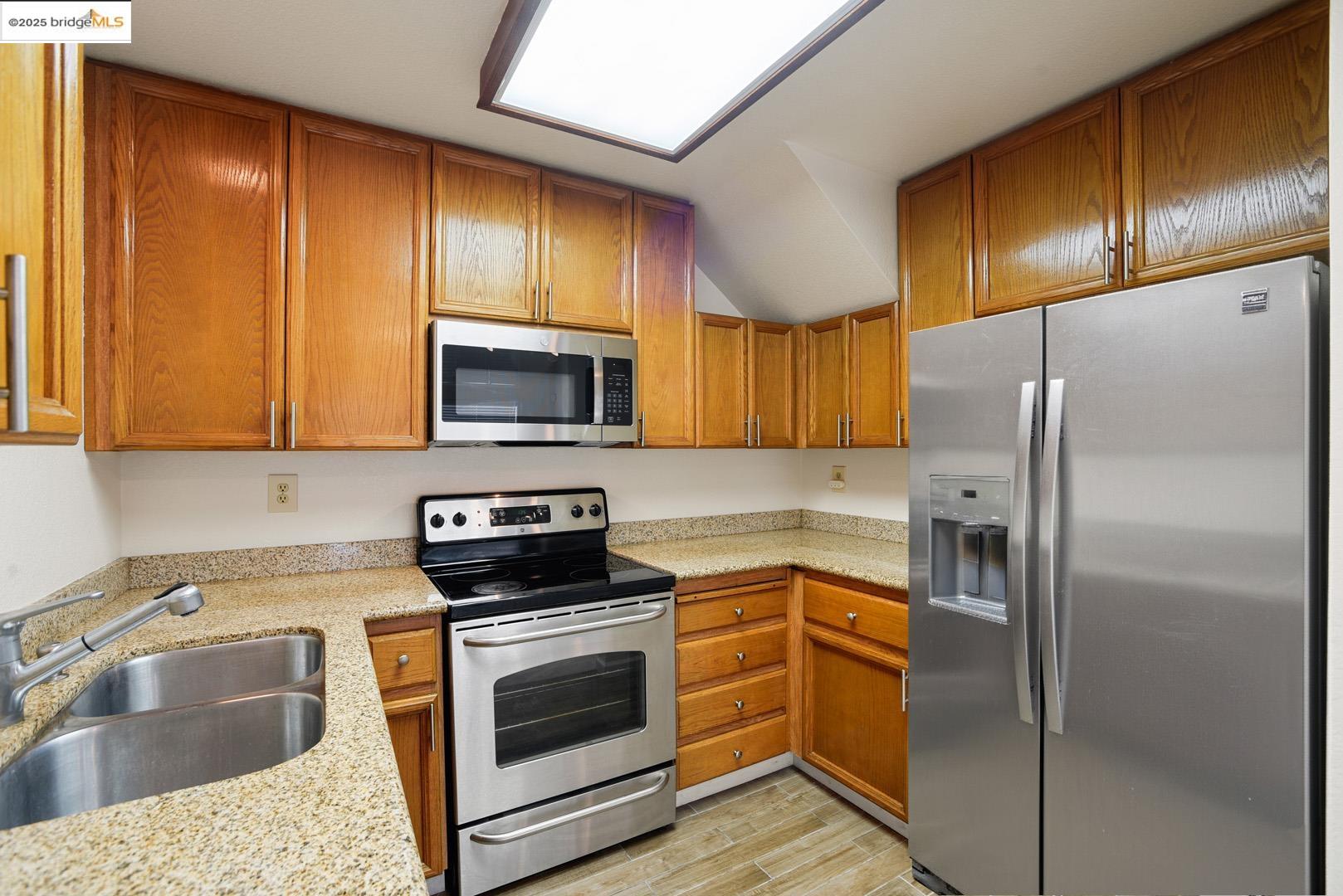 44 Glenwood Hercules, CA 94547 - Photo 8 of 35 a kitchen with a refrigerator sink and microwave
