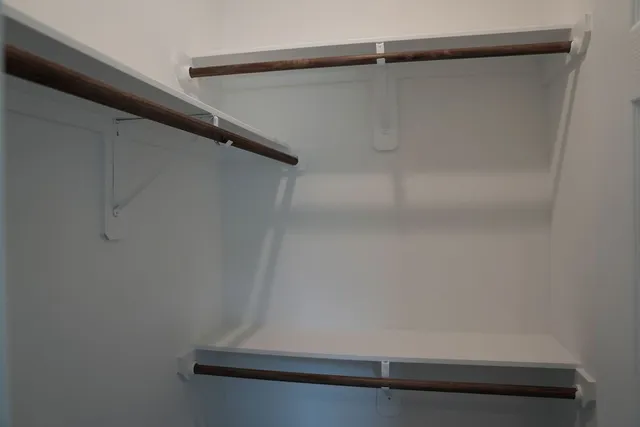 a view of small space with racks on the wall