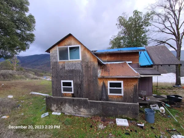 a view of backyard with green space