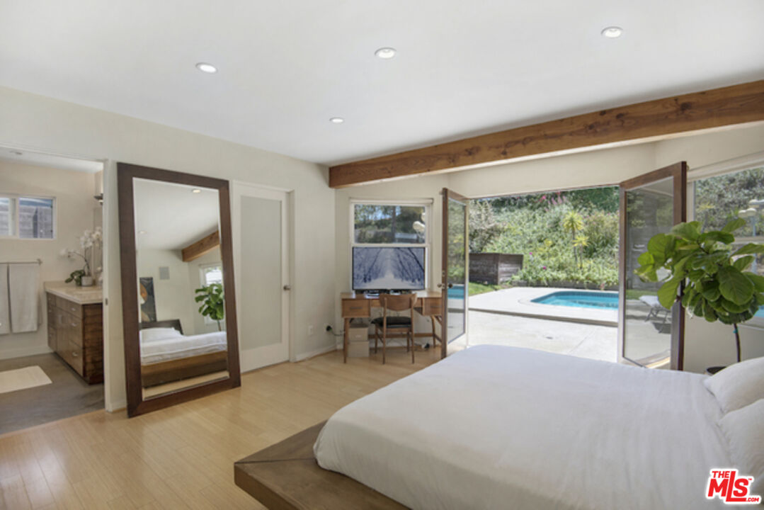 8152 Amor Road Los Angeles, CA 90046 - Photo 12 of 27 a living room with furniture and a large window