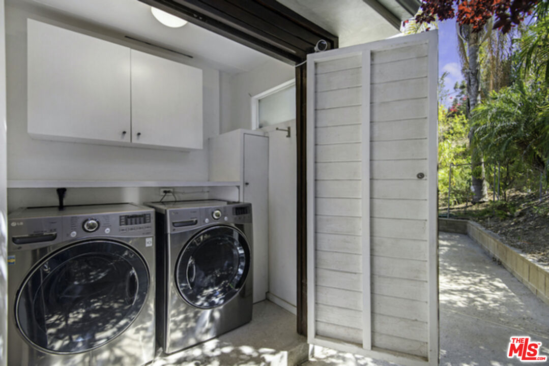 8152 Amor Road Los Angeles, CA 90046 - Photo 27 of 27 a utility room with dryer and washer