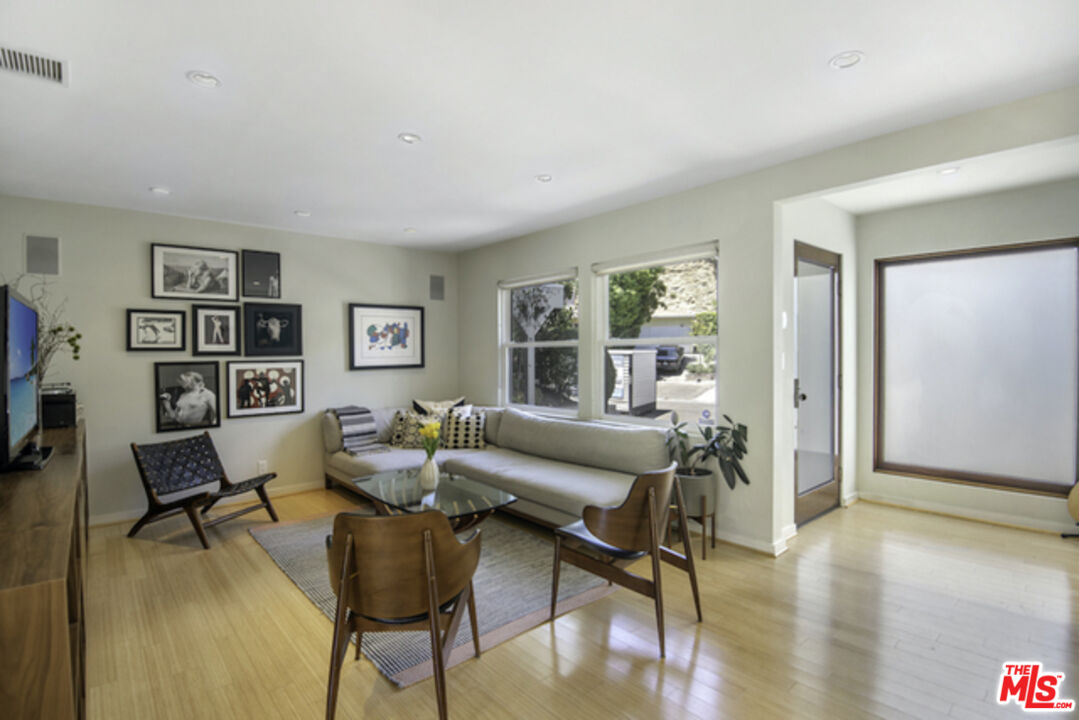 8152 Amor Road Los Angeles, CA 90046 - Photo 4 of 27 a living room with furniture and wooden floor