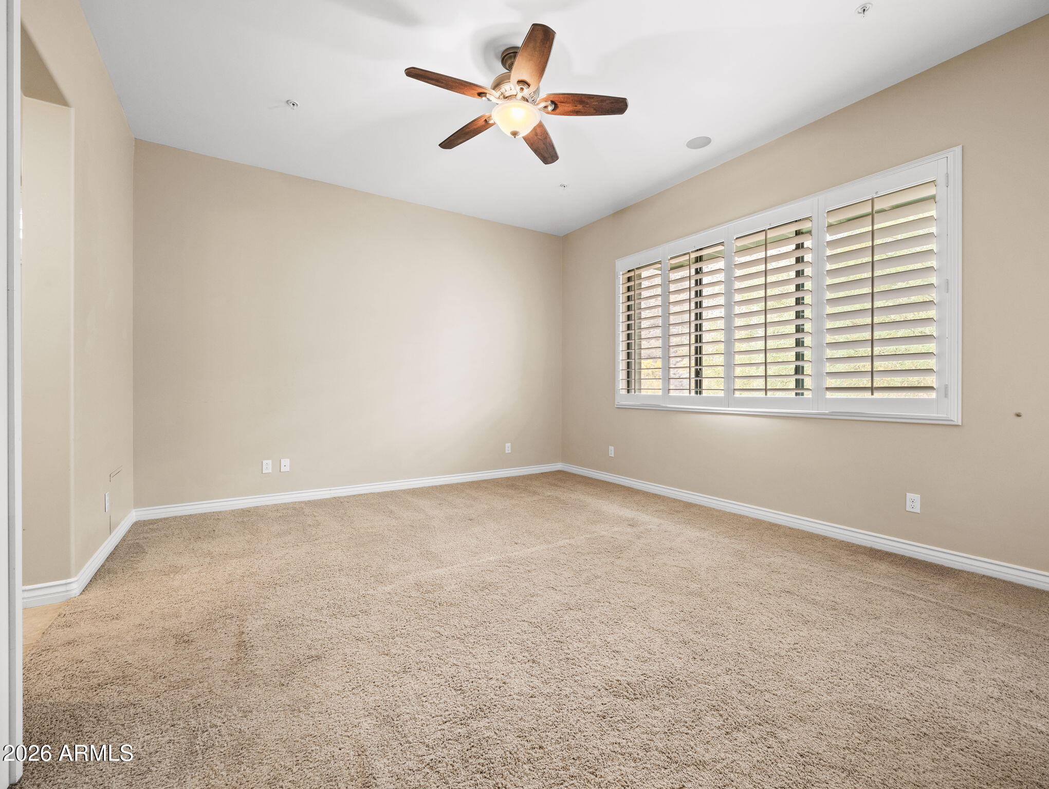 36600 North Cave Creek Road, Unit B14 Cave Creek, AZ 85331 - Photo 11 of 29 a view of an empty room with a window