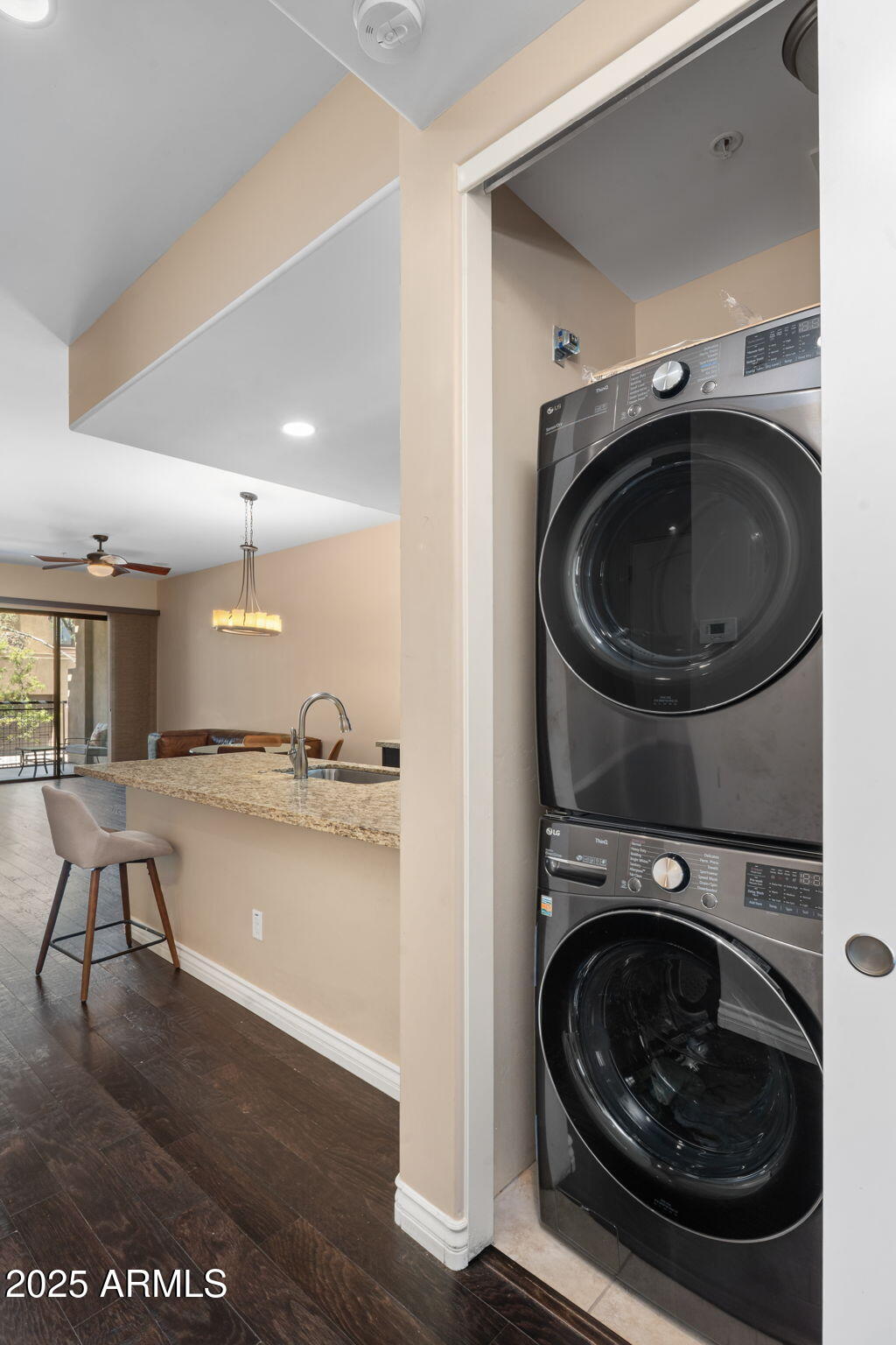 36600 North Cave Creek Road, Unit B14 Cave Creek, AZ 85331 - Photo 17 of 29 a view of a kitchen with sink washer and dryer