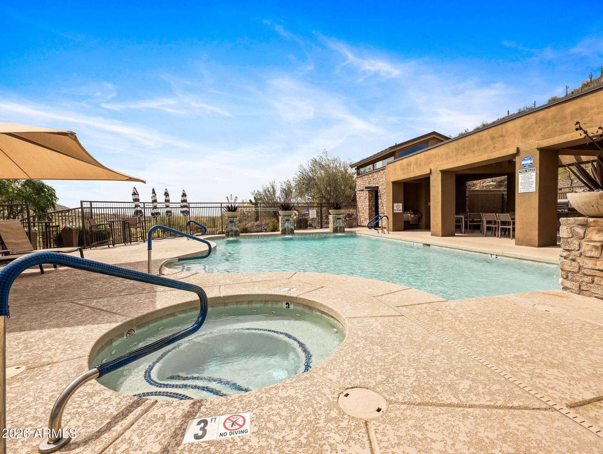 36600 North Cave Creek Road, Unit B14 Cave Creek, AZ 85331 - Photo 27 of 29 a view of a house with a swimming pool