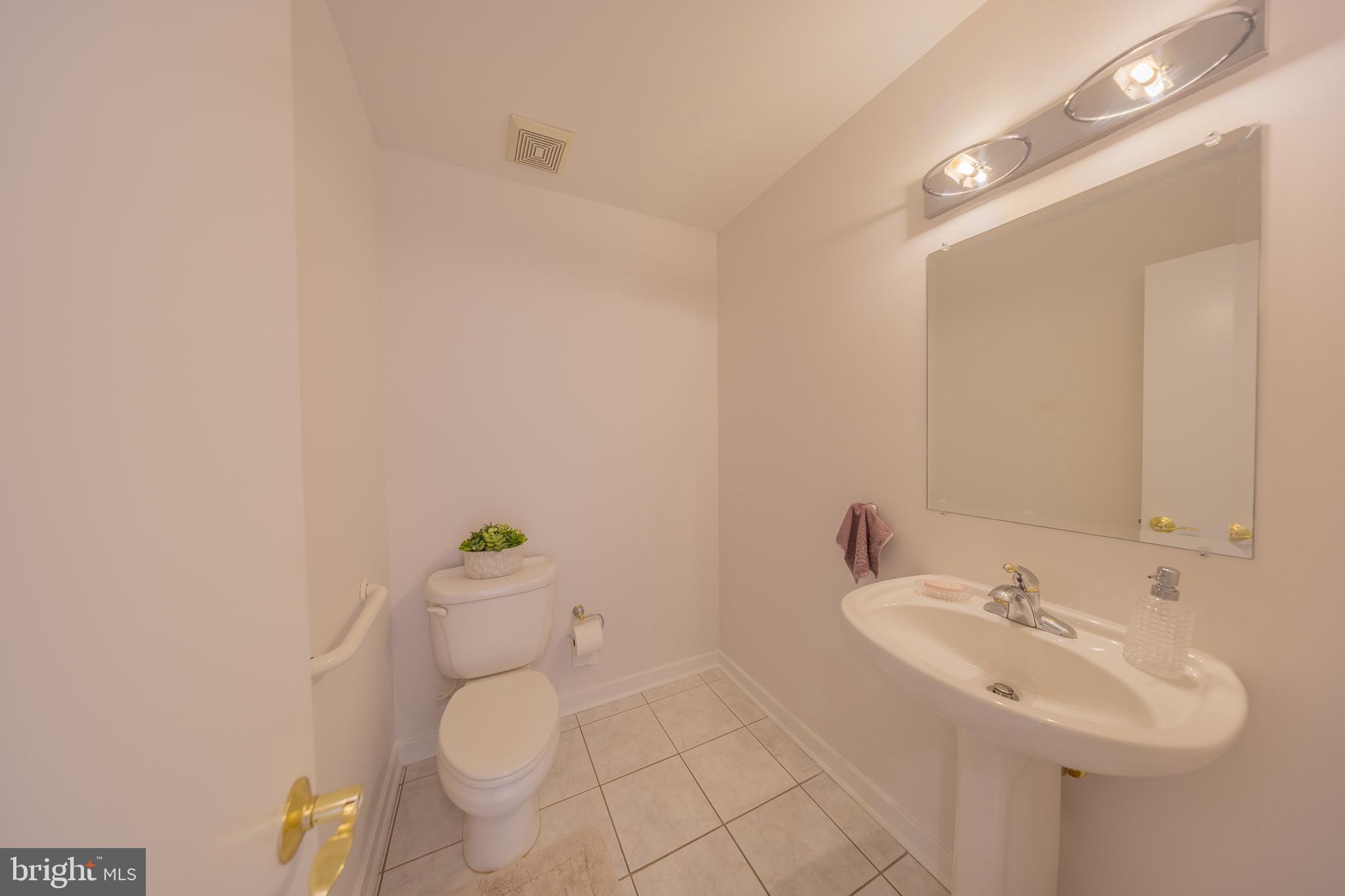 2201 Cedar Cove Court Reston, VA 20191 - Photo 6 of 25 Convenient main-level half bath.