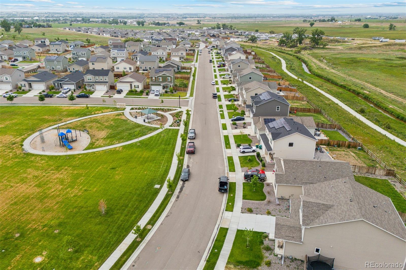2175 Alyssa Street Fort Lupton, CO 80621 - Photo 32 of 39 an aerial view of a house with a garden