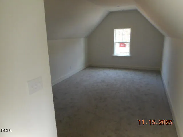 a bathroom with a toilet sink and window