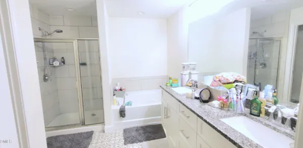 a kitchen with a sink and refrigerator