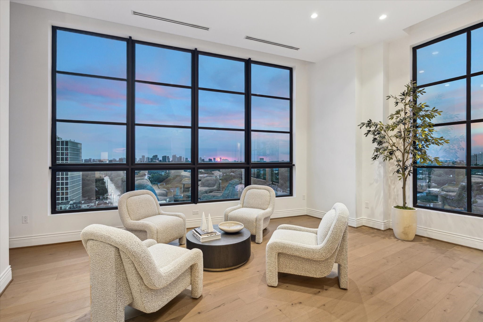 2323 San Felipe Street, Unit 1101 Houston, TX 77019 - Photo 3 of 25 a living room with furniture and a large window